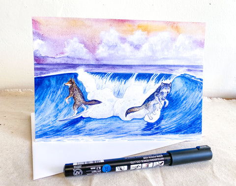 surfing wolves greeting card